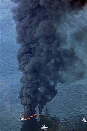 Oil is burned on the surface of the Gulf of Mexico a few miles from the site of the Deepwater Horizon disaster Wednesday, June 16, 2010. Oil is still leaking from the wellhead. AP Photo / Dave Martin