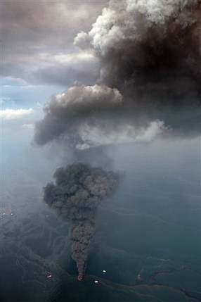 Oil is burned on the surface of the Gulf of Mexico a few miles from the site of the Deepwater Horizon disaster Wednesday, June 16, 2010. Oil is still leaking from the wellhead. AP Photo / Dave Martin