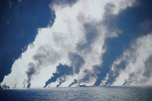 Smoke plumes from spill-response crews gathering and burning oil in the Gulf of Mexico near the site of the leaking Macondo well. Photo taken June 22, 2010. Photo courtesy Dr. Oscar Garcia / Florida State University. 