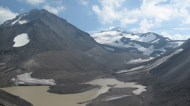 Collier Glacier, 27 August 2010. Collier Glacier in the Oregon Cascade Range once filled this valley - note marks on North Sister, at left, from its maximum size more than 100 years ago. It's now shrunk to less than half of its previous mass. Oregon State University