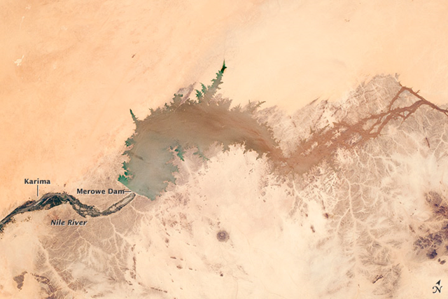 The Merowe Dam is located near the 4th cataract of the Nile River. This astronaut photograph illustrates the current extent of the reservoir, which has been filling behind the dam since the final spill gate was closed in 2008. Astronaut photograph  ISS025-E-6160 was acquired on October 5, 2010, and is provided by the ISS Crew Earth Observations experiment and Image Science & Analysis Laboratory, Johnson Space Center. earthobservatory.nasa.gov