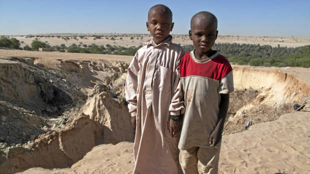 Erosion is threatening to destroy a school in the town of Mao, in the Sahel region of Chad. In this photo, two children are standing in front of a fast-growing gully that threatens to swallow up their school. According to town leaders, the lack of rain has left the ground so dry that it easily crumbles away. When rain finally arrived this year, most of it came in torrential storms that caused heavy damage. Geoffrey York / The Globe and Mail