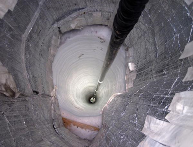 Sensor descends down a hole in the ice as part of the final season of IceCube. Icecube is among the most ambitious scientific construction projects ever attempted. Credit: NSF / B. Gudbjartsson