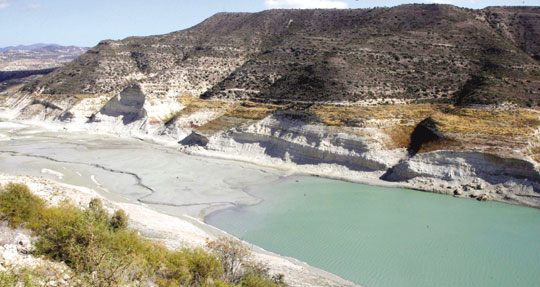 An aerial view shows depleted water reserves at Kouris reservoir in Limassol district, Cyprus, 25 November 2007. timesofmalta.com