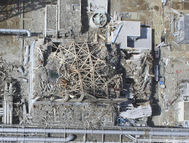In this March 24, 2011 aerial photo taken by a small unmanned drone and released by AIR PHOTO SERVICE, damaged Unit 3 of the crippled Fukushima Dai-ichi nuclear power plant is seen in Okumamachi, Fukushima prefecture, northern Japan. Air Photo Service Co. Ltd., Japan / cryptome.org