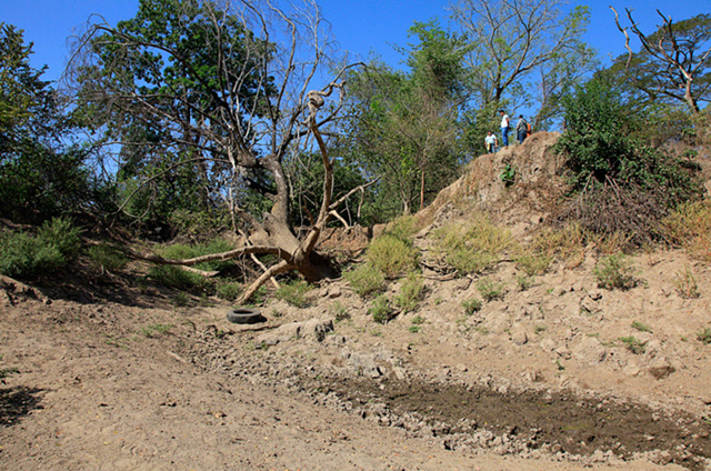 Levies in El Salvador have been breached by severe flooding from intensified storms linked to climate change. Erika Blumenfeld / AJE