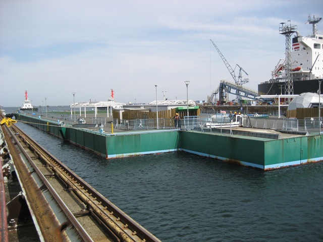 Arrival of 'Mega Float' at the Yokohama port, 7 April 2011. The float is made up of huge boxes which now have holes in them to store up to 10,000 tons of contaminated water. TEPCO