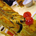 cherries to cover the sharp parts of the lobster. but why?