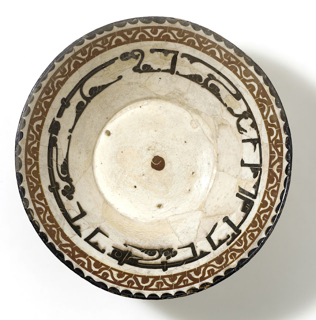 The inscription on this bowl reads, "Generosity is a disposition of the dwellers of Paradise." The letters are horizontally elongated to fit the available space. Iran, Nishapur. 10th century. Kufic script. Courtesy of the Nasser D Khalili Collection of Islamic Art.