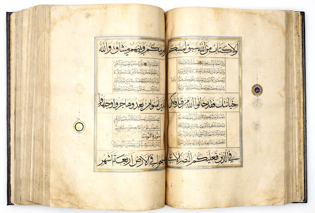 The illumination of the opening spread is in the Timurid Herati style of the late 15th century. The top and bottom darker headings are in the muhaqqaq script, and the middle darker heading is in the thuluth script.erat or Tabriz, Iran. 1525-1550 A.D. Muhaqqaq, Thuluth and Naskh scripts. 36 x 24.5 cm. Courtesy of the Nasser D Khalili Collection of Islamic Art.