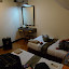 Our second guesthouse room, as demonstrated by the lovely Alan Wong