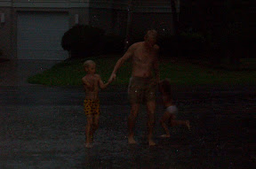 Daddy, Jack and Sara doing a rain dance.