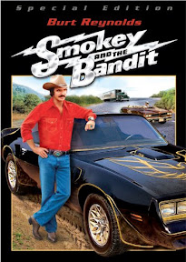 smokey and the bandit movie poster with burt reynolds as bo darville and his pontiac trans am special edition