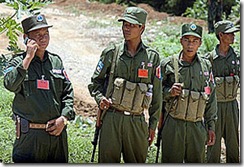 Members of the ethnic Wa Army stand guard in Pangsan, north of Kyaing Tong in the famous Golden Triangle region in eastern Myanmar, 15 August 2006. The authorities of Myanmar's two administrative regions, East Mongla Special Administrative Region-4 and North Wa Special Administrative Region-2 in Shan states, said that they are committed to continue their fight against the narcotics trade in the region. AFP PHOTO/ Khin Maung Win
