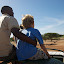 Pastor David and Avery on top of the truck