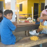 Armando and Winston making hammocks with instructor Juan Carlos (Pikachu)