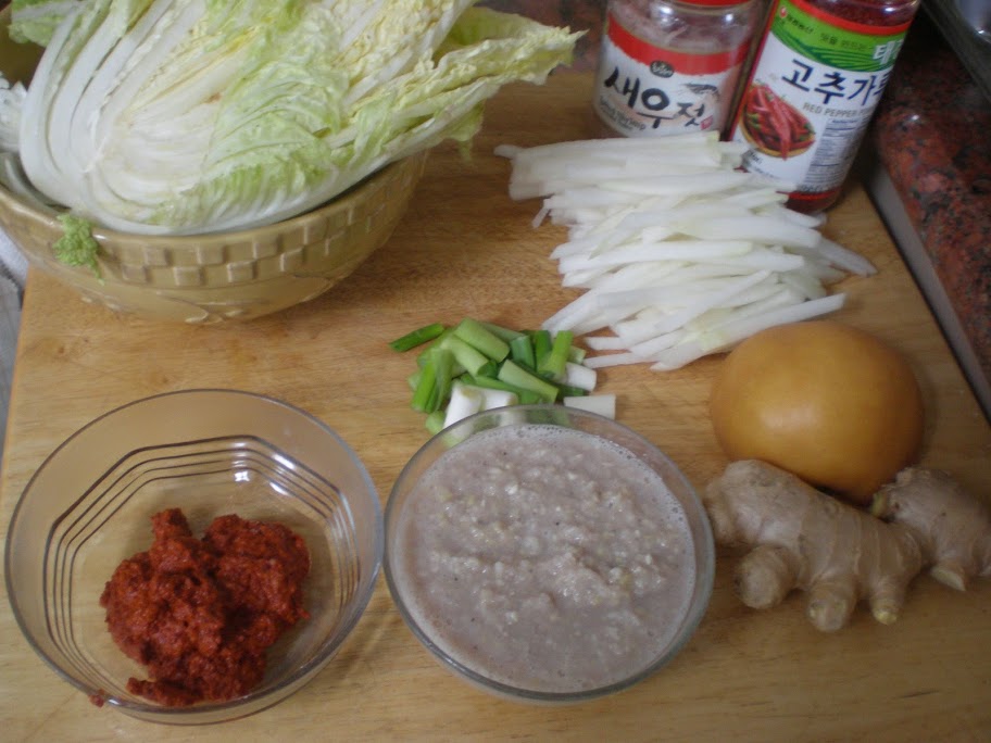 The ingredients with the two homemade sauce-pastes in the bottom left