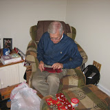 Dan's dad opens up some coins, Christmas 2009