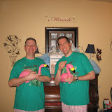 Katie's dad and Dan with matching pajamas and "lawn ornaments" to tease Katie, Christmas 2009