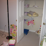 Newly hung shelves in the baby closet.