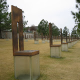 The chairs at the memorial illuminate at night.