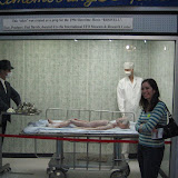 Katie poses near the alien body used in the Showtime Movie, “Roswell.”
