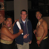 Two Maori performers pose with Dan