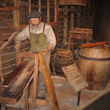 A model of a “cooper” who would make the wooden barrels