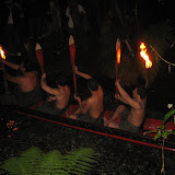 The Maori Warrior performers make their entrance on a “Waka” (“Canoe”)
