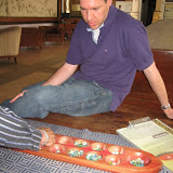 One of the hotel staff teach us the game of Congkak.
