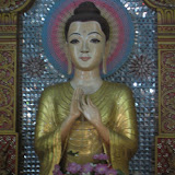 One of the statues inside the Burmese Buddhist Temple.