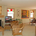 The living/dining room includes an HDTV, Internet, i-Pod and phone.
