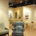The den expands into the full kitchen and dining area.