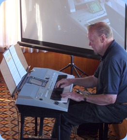 Colin Crann plaing his new Yamaha PSR-710 keyboard for the arrival music