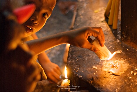 Kids Playing with Candles at Malabon Cemetery