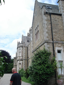 No playgrounds or anything, just a small patch of grass and gravel.. Nice building though