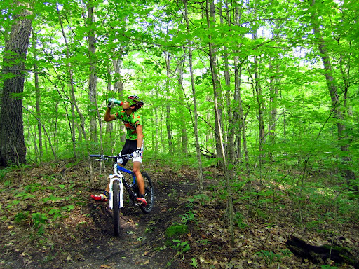 Taking a short break after climbing out of a singletrack section.