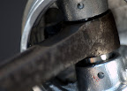 Piston arm on piston head.