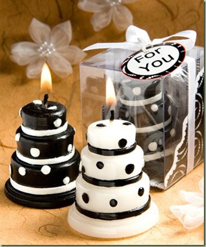 Luscious black and white wedding cake candle favors