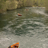 Some boats floating in the 2009 Wooden Boat Parade on the McKenie River