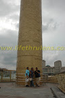 at the foot of the tower at the foot of the tower