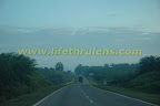 road after exiting expressway road after exiting expressway