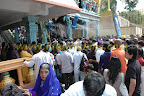crowd near foot of stairs crowd near foot of stairs