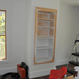 Priming the new built in bookcase.