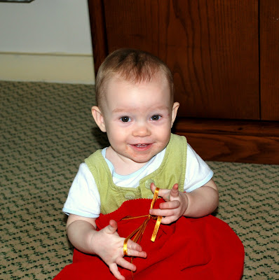 Claire playing with Santa's sack