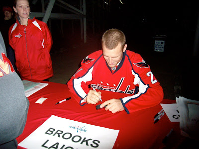 Hes smilin...and signing my puck!