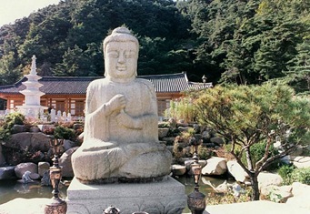 Gunwi Seated stone trinity vairocana buddha statues at grotto