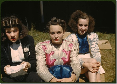 Backstage at the "girlie" show at the state fair. Rutland, Vermont, September 1941. Reproduction from color slide. Photo by Jack Delano. Prints and Photographs Division, Library of Congress