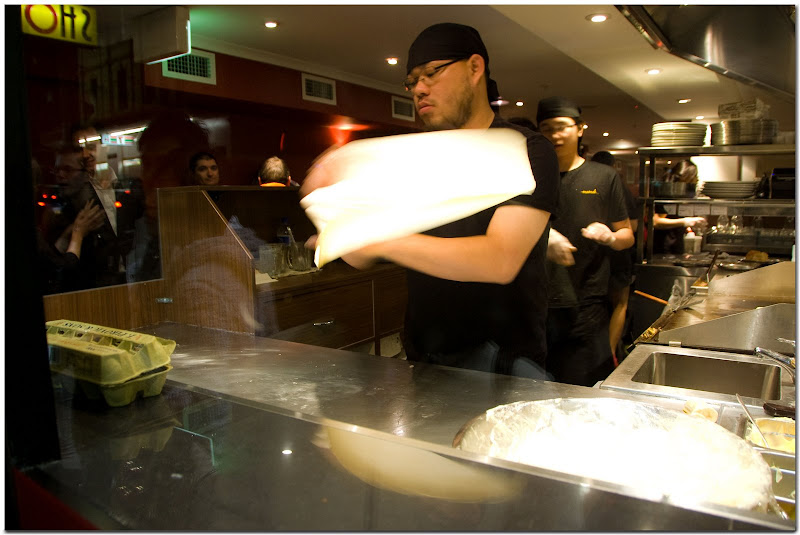 Tossing roti dough