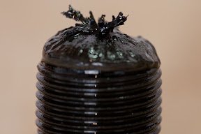 Metal shavings on filler-cap magnet